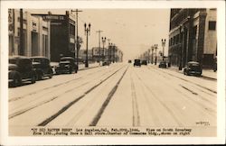 View on South Broadway from 12th, during a Snow & Hail Storm in 1944 Postcard