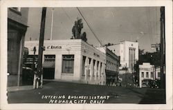 Entering Business District Postcard