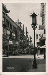 China Town street picture showing cars and business traffic San Francisco, CA Postcard Postcard Postcard