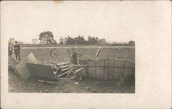 Single wing plane crashed in field Postcard