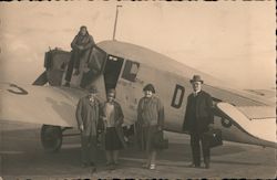 Family Boarding Plane Postcard