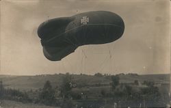 German Blimp over a Field Airships Postcard Postcard Postcard