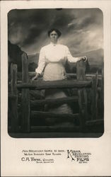 Studio Photograph of Woman standing behind fence with backdrop of storm on mountain Boyes Hot Springs, CA Postcard Postcard Postcard