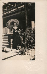 Woman with parasol umbrella posed outside porch Calistoga, CA Postcard Postcard Postcard