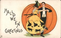 Halloween Greetings. Elegant Couple Dancing in front of a Pumpkin Postcard