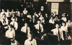 Classroom photo of students at desks Postcard