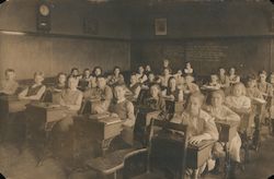 Classroom photo with students at desks Postcard