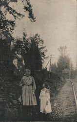 Four young girls with U.S. Flags standing by railroad tracks Children Postcard Postcard Postcard