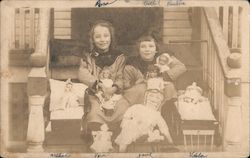 Two girls with several of their dolls Postcard Postcard Postcard