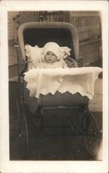 Baby in wicker baby buggy Babies Postcard Postcard Postcard