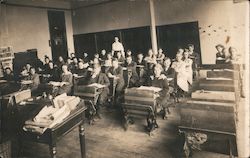 Children and Teacher in a Schoolroom Postcard