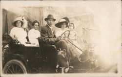 Man and Women in Car Postcard