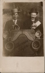 Thomas Flyer. Studio photo of two men sitting in car. Postcard Postcard Postcard