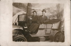 Studio photo of two men in open car Postcard Postcard Postcard