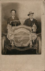 Thomas Flyer. Studio photo of two men sitting in car. 1323 Postcard Postcard Postcard