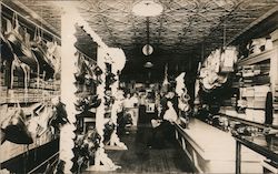 Inside a clothing and shoe store Postcard