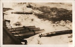 Torpedoes being launched from ship at sea Postcard