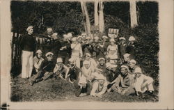 USS Pennsylvania Sailors resting on shore. Guns drawn. Postcard