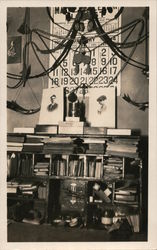 Bookcase with books, portraits, January 1914 calendar on wall Occupational Postcard Postcard Postcard