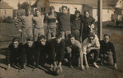 Neighborhood football players posing, team-style Postcard