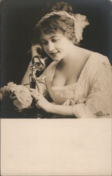 Buxom Woman using telephone Postcard