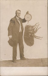 Man holding scale and weighing enormous Flea Exaggeration Postcard Postcard Postcard