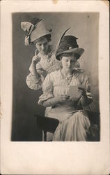 Two Women Reading a Letter Postcard