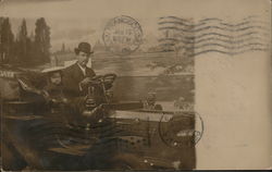 Studio photo of man and child in car Postcard