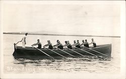 Standing by - Men rowing boat Postcard