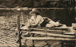 Sexy Woman Fishing on Dock Postcard