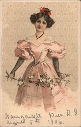 Woman in a pink dress with puffed sleeves, holding a flowering branch Postcard