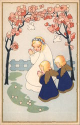 Woman dressed in white, praying, with little angels praying behind her. Flowers & birds overhead. Postcard