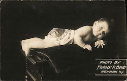 Baby wearing a flour-sack diaper Babies Frank P. Bond Postcard Postcard Postcard