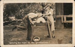 Holding his nose to the grindstone Postcard