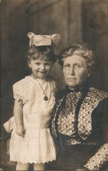 Grandmother and Granddaughter Posing Together Postcard