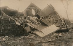 Tornado? Man stands among the ruins of a demolished building Disasters Postcard Postcard Postcard