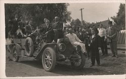 Group of men in and around a car Postcard Postcard Postcard