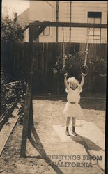 Greetings from California - Girl on Swingset Postcard