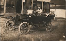 Man - and dog - sitting in car in front of building Cars Postcard Postcard Postcard