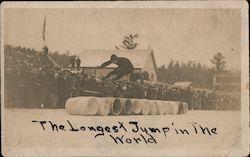 The Longest Jump in the World--man jumping over ten barrels Postcard