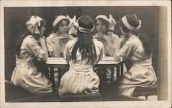 Trick Photograph: Girl At Table Postcard