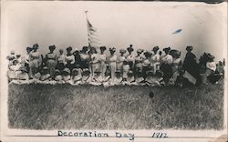 Decoration Day 1912 - Group of women and girls wearing hats and dresses, posing outside Postcard