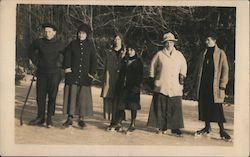 Ice Skaters Pose for a Picture Postcard