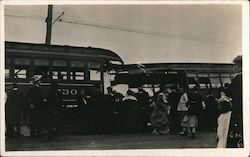 People Gathered Near a Train Postcard