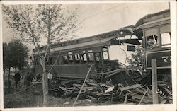 People standing near wreckage of a train Postcard