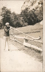 Man Playing an Alpenhorn Postcard