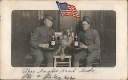 Two WWI soldiers drinking beer with their Collie Postcard