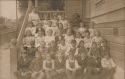 A class poses on the steps outside School and Class Photos Postcard Postcard Postcard