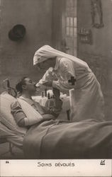 Red Cross Nurse feeding injured man World War I Postcard Postcard Postcard