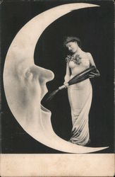 Woman in Elegant Dress with Grapes is Pouring Champagne into a Moon with a Face and Mouth Open Moons Postcard Postcard Postcard